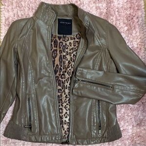 Taupe leather jacket.